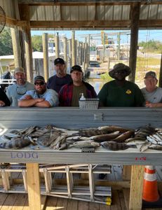 A group of 6 people fishing in LA