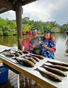 Three people fishing at St Bernard