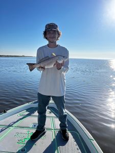 Angler with redfish in LA