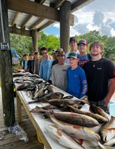 A group of 11 people fishing in LA
