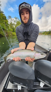 A person fishing in Central Point