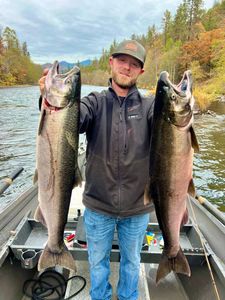 Two coho salmon caught on a fishing tour in OR
