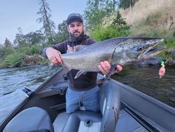 Angler with a big fish in Central Point