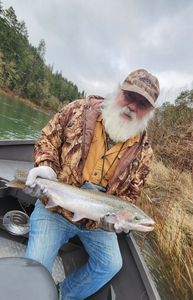 An angler fishing for a rainbow trout in Central Point