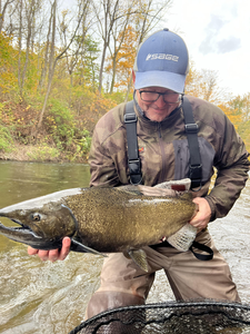 Great catch using fly fishing technique! Partly cloudy conditions made for an exciting adventure.