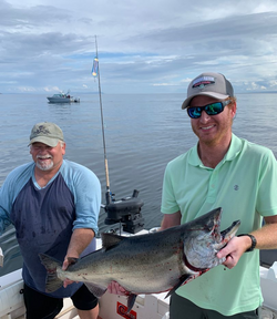 A pair of anglers enjoying a fishing trip in Zeballos
