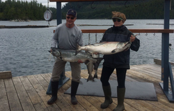 Two anglers with a catch of two big fish in Zeballos
