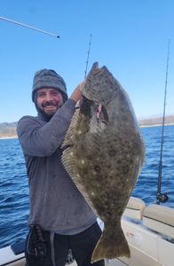 Photograph of a person fishing for a California Flounder in CA