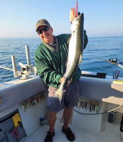 A lone angler fishing in Manistee