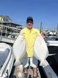 Angler with 2 large fish in New Jersey