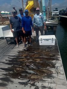Five people enjoying a cruises and fishing adventure in NJ