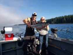 Two people fishing in the scenic Port Renfrew