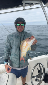Angler reeling in a 13-inch catch in FL