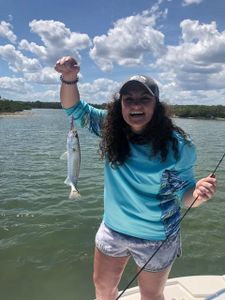 Lone fisherman in unknown location