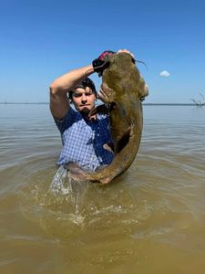 A person fishing in Lockesburg