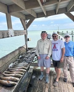 Three people fishing in Corpus Christi