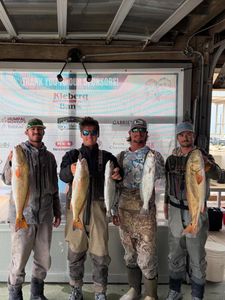 Successful fishing trip displaying redfish and speckled trout catch in Corpus Christi TX