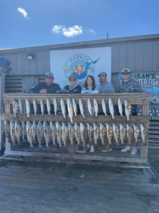 Group of 7 people fishing in Corpus Christi