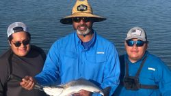 3 people fishing in TX
