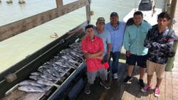 5 people fishing in Corpus Christi