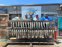 Five people enjoying a fishing trip in Corpus Christi