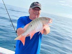 A mutton snapper fish caught while fishing in Marathon