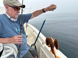 Angler with a 7-inch fish in NC