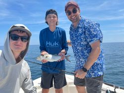 Three people fishing in North Carolina