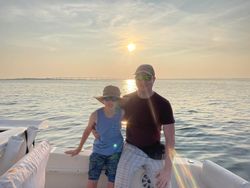 Two people fishing at Kitty Hawk