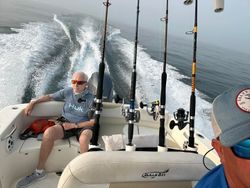 Two people enjoying a fishing trip in Kitty Hawk