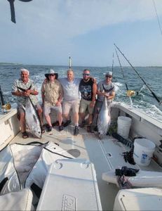 Two fishermen in Fairhaven catching fish