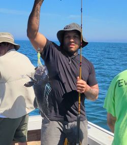 A person fishing in Massachusetts