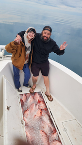 Two people enjoying fishing tours in FL