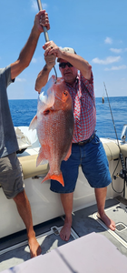 Angler with fishing rod at Carrabelle