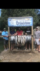 4 people fishing in MI