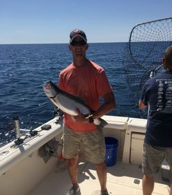 Angler with a fishing rod in Port Austin
