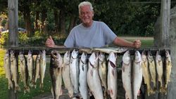 Angler holding 15 caught fish in MI