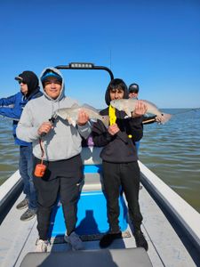 Two people fishing at South Padre Island