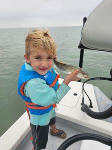 A person fishing in Texas