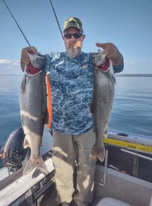 Angler with 2 rainbow trout caught in NY