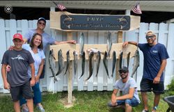 4 fish caught by 5 people fishing in Michigan