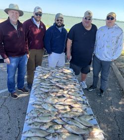 Group of five people in Wylie, fishing
