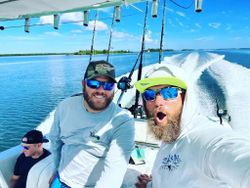 Three people enjoying a scenic Chesapeake adventure.