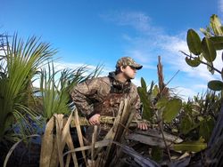 A person fishing in the beautiful state of FL