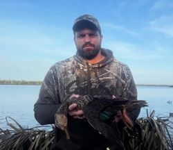 Person enjoying FL cruises, fishing, hunting, and tours