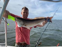 One person, a big 22-inch fish, and scenic FL location