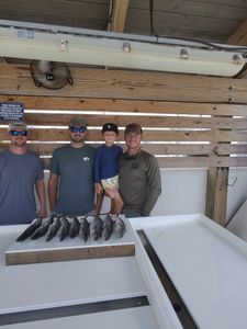 4 people fishing in Alabama