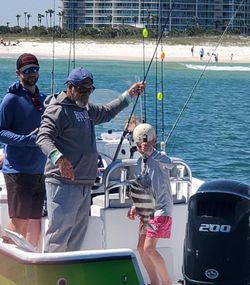 4 people fishing at Orange Beach