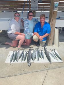 Three people fishing in Orange Beach