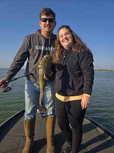 Two people fishing in TX